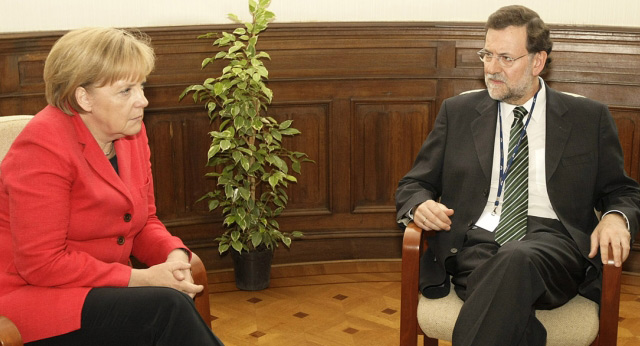 Mariano Rajoy con Angela Merkel en la Cumbre del PPE